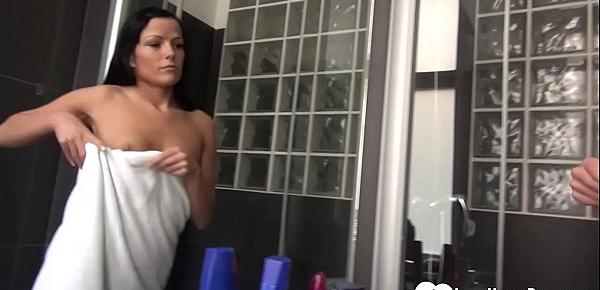  Beautiful teen uses a toy after the shower